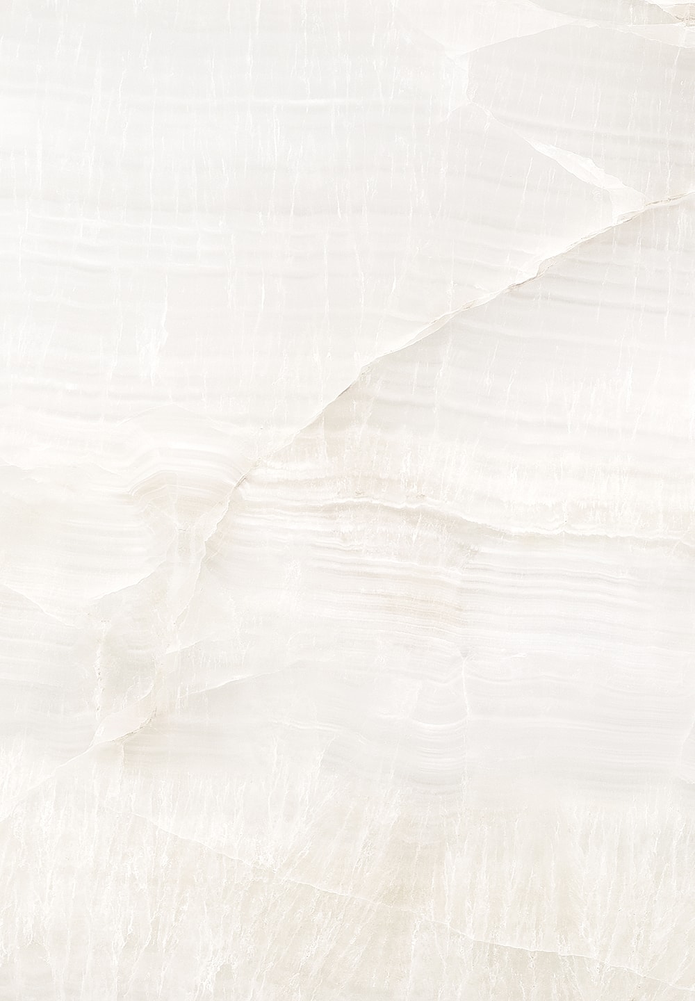 Textured white marble surface with subtle veins.