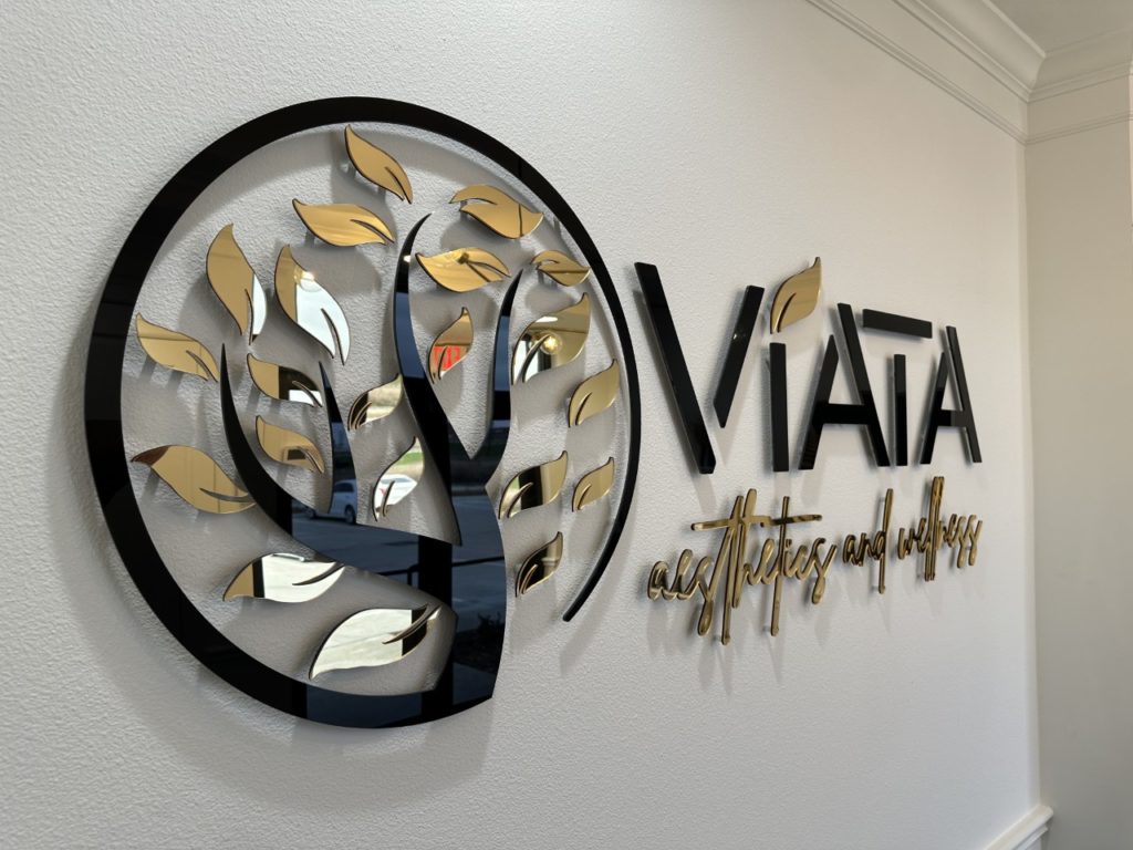 Wall with Viata Aesthetics and Wellness Logo | Viata Aesthetics and Wellness in Katy TX