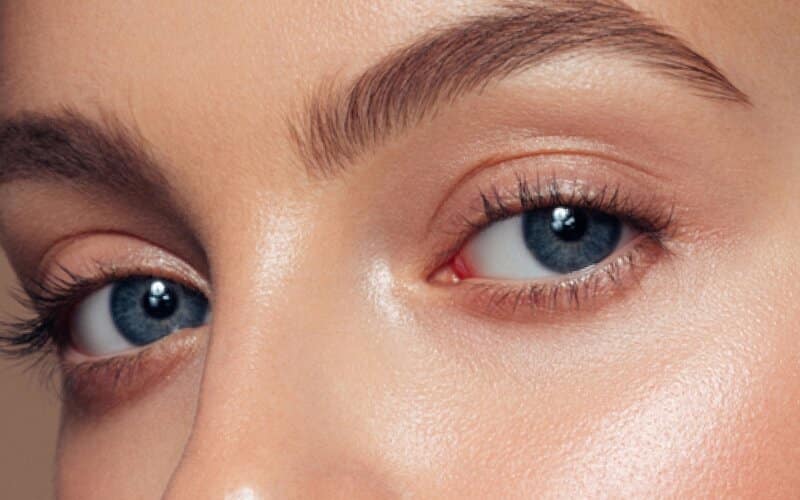 Female eye close-up. Macro. Perfect makeup and eyebrows. Beautiful green-brown eyes | Viata Aesthetics and Wellness in Katy TX