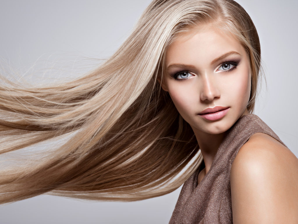 Face Of The Beautiful Young Woman With Long Straight Hair | Viata Aesthetics and Wellness in Katy TX